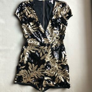 Sequenced gold and black Romper